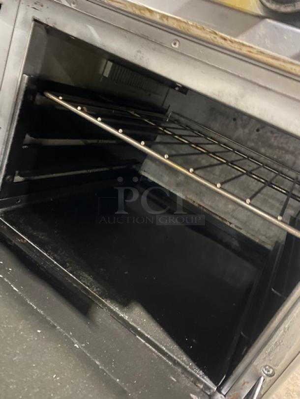Standard Range Commercial Stainless Steel Natural Gas Powered 8 Burner Range! With 2 Full Sized Ovens Underneath! With Back Splash & Overhead Salamander Shelf! With Metal Oven Rack! On Casters! - Image 8 of 10