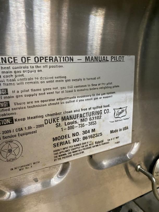 Duke Commercial Stainless Steel Natural Gas Powered 4 Well Hot Food/Steam Table! With Pan Rail! With Single Shelf Stand! On Legs! Model: 304 M SN: 06162325! - Image 8 of 9