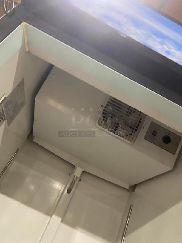 Kelvinator Commercial Single Glass Door Reach In Refrigerator Merchandiser! With Poly Coated Racks! On Casters! 115V! Model: KCGM24RB SN: 1B41701398! - Image 6 of 8