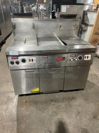 Sweet! Frymaster Commercial Natural Gas Powered 2 Bay Deep Fat Fryer! With Middle Dumping Station! With Back Splash! All Stainless Steel! With Grease Filter Underneath! On Casters! 110-120V! Model: FM245EBLMSC SN: 0012GI0053!