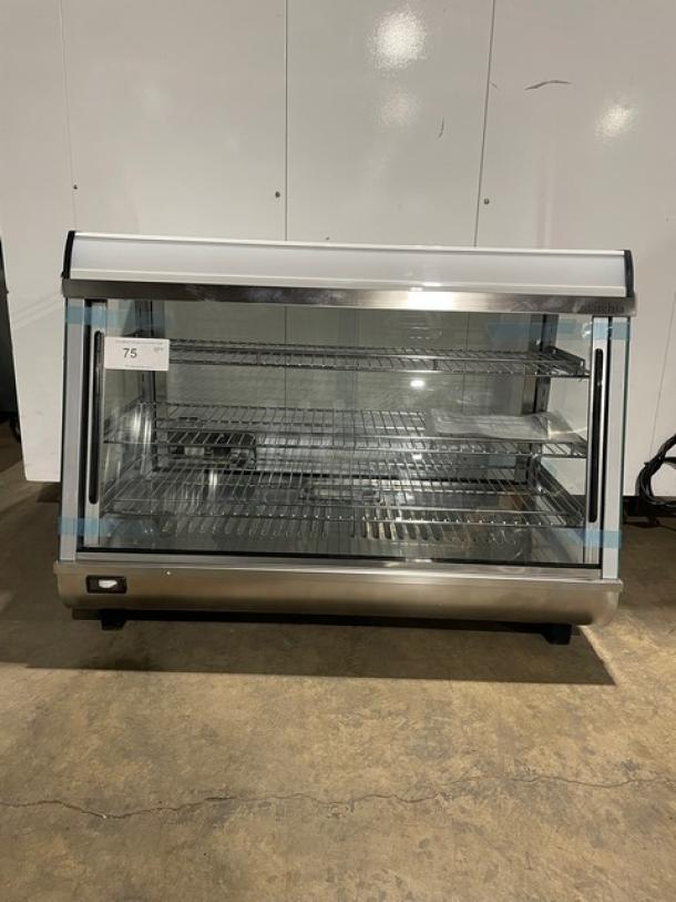 New! Scratch-N-Dent! Marchia Commercial Stainless Steel 34" Heated Countertop Display/Showcase! With Front & Rear Sliding Glass Doors! With Chrome Plated Wire Racks! Model: SHCC136! 110-120V! On Legs! - Image 1 of 10