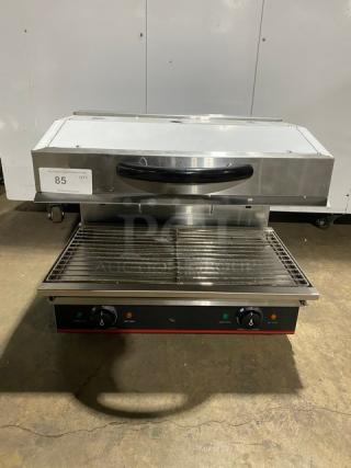 New! Scratch-N-Dent! Cookline! 2023! Commercial Stainless Steel Electric Powered 28" Countertop Salamander! With Adjustable Cooking Clearance! With Cool-To-The-Touch Handle! With Drip Tray & Cooking Grate! Model: ES-28 SN: 2302028134! 240V! On Legs!