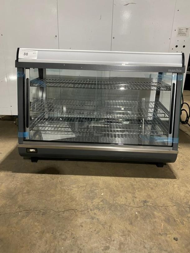 New! Scratch-N-Dent! Marchia Commercial Stainless Steel 36" Countertop Heated Display/Showcase! With Front & Back Sliding Glass Doors! With LED Lighting! With Tempered Glass! With Adjustable Chrome Plated Wire Racks! Model: MHCC136! 110-120V! On Legs! - Image 1 of 10