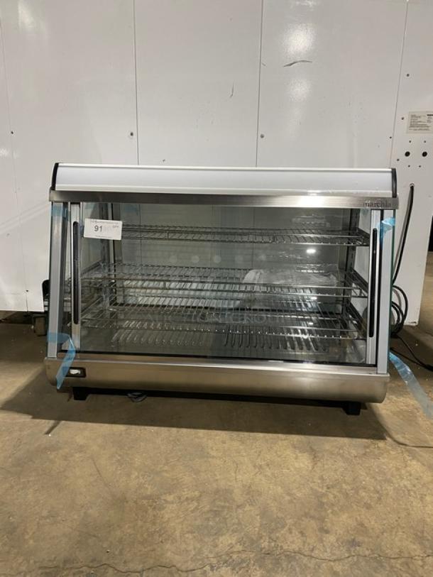 New! Scratch-N-Dent! Marchia Commercial Stainless Steel 34" Heated Countertop Display/Showcase! With Front & Rear Sliding Glass Doors! With Chrome Plated Wire Racks! Model: SHCC136! 110-120V! On Legs! - Image 1 of 12