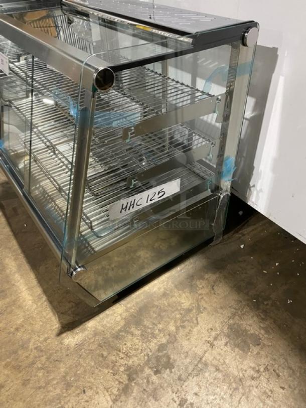 New! Scratch-N-Dent! Marchia Commercial Stainless Steel 27" Countertop Slanted Glass Heated Display/Showcase! With Front & Rear Sliding Glass Doors! With Adjustable Chrome Plated Wire Racks! Model: MHC125! 110-120V! On Legs! - Image 2 of 11