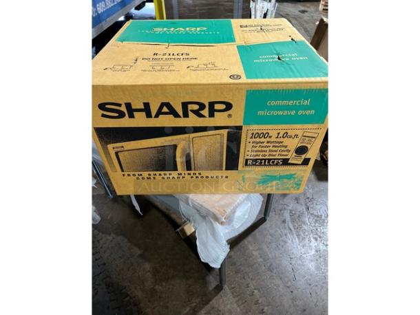 Brand New In The Box! Sharp! 2024! Commercial Stainless Steel Countertop Microwave Oven! With Light Up Dial Timer! Model: R-21LCFS! 120V! On Legs! - Image 1 of 3