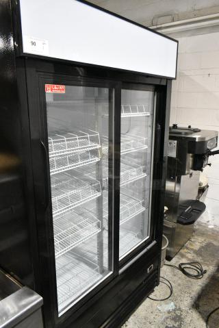 JDM-40SD Metal Commercial 2 Door Reach In Cooler Merchandiser w/ Poly Coated Racks on Commercial Casters. 115 Volts, 1 Phase. Tested and Powers On But Does Not Get Cold