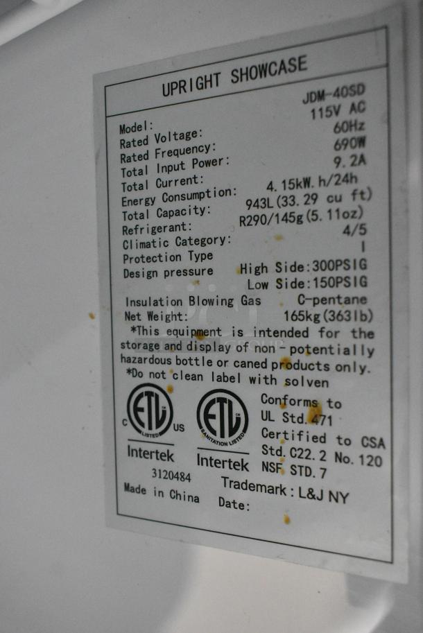 JDM-40SD Metal Commercial 2 Door Reach In Cooler Merchandiser w/ Poly Coated Racks on Commercial Casters. 115 Volts, 1 Phase. Tested and Powers On But Does Not Get Cold - Image 3 of 5