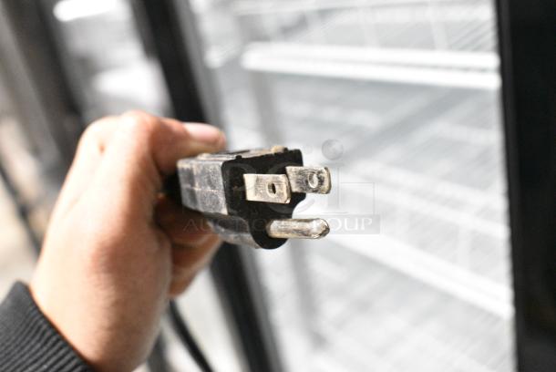 JDM-40SD Metal Commercial 2 Door Reach In Cooler Merchandiser w/ Poly Coated Racks on Commercial Casters. 115 Volts, 1 Phase. Tested and Powers On But Does Not Get Cold - Image 4 of 5