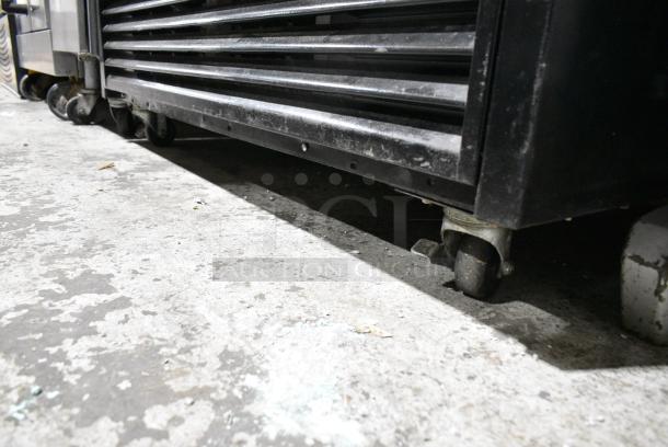 JDM-40SD Metal Commercial 2 Door Reach In Cooler Merchandiser w/ Poly Coated Racks on Commercial Casters. 115 Volts, 1 Phase. Tested and Powers On But Does Not Get Cold - Image 5 of 5