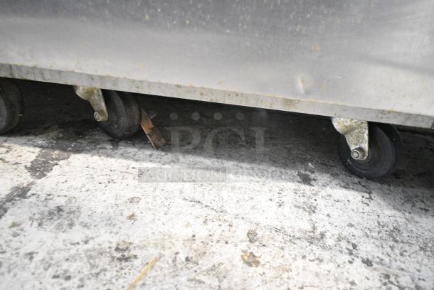 Beverage Air HR1-1S-18 Stainless Steel Commercial Single Door Reach In Cooler w/ Poly Coated Racks on Commercial Casters. 115 Volts, 1 Phase. Tested and Powers On But Does Not Get Cold - Image 5 of 6