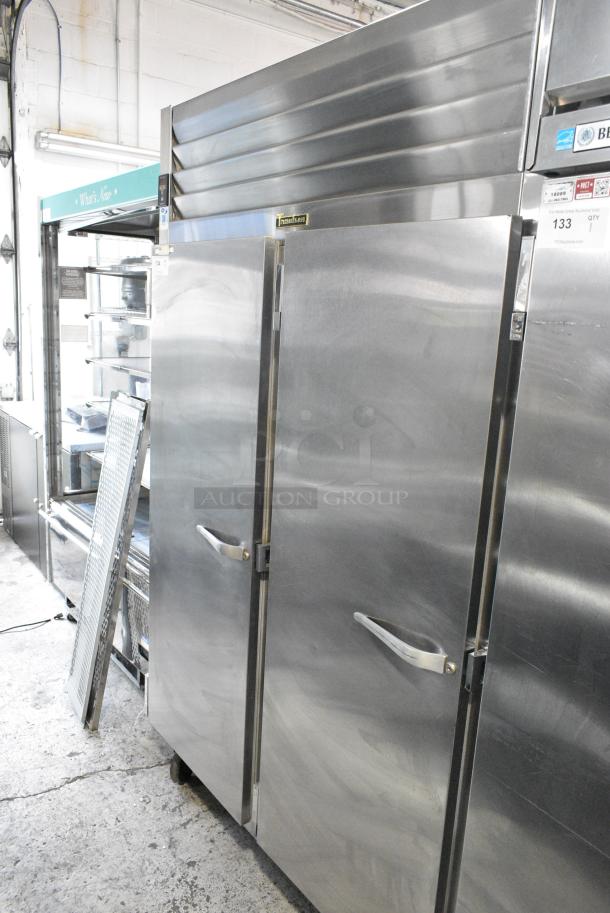 Traulsen RHT232NUT-FHS Stainless Steel Commercial 2 Door Reach In Cooler w/ 2 Metal Racks on Commercial Casters. 115 Volts, 1 Phase. Tested and Powers On But Does Not Get Cold - Image 1 of 7