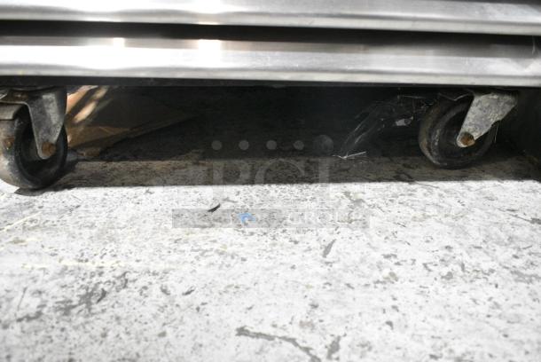 True T-23G Stainless Steel Commercial Single Door Reach In Cooler Merchandiser w/ Poly Coated Racks on Commercial Casters. 115 Volts, 1 Phase. Tested and Working! - Image 4 of 5