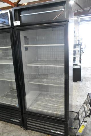 2019 True GDM-26F-HC Metal Commercial Single Door Reach In Freezer Merchandiser w/ Poly Coated Racks. 115 Volts, 1 Phase. Tested and Working!