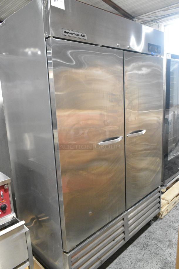 Beverage Air KF48-1AS Stainless Steel Commercial 2 Door Reach In Freezer w/ Poly Coated Racks on Commercial Casters. 115 Volts, 1 Phase. Tested and Powers On But Does Not Get Cold - Image 1 of 5