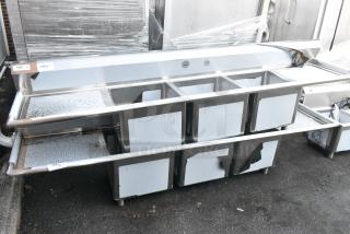 BRAND NEW SCRATCH AND DENT! Regency 600S31818224 Stainless Steel Commercial 3 Bay Sink w/ Dual Drain Boards. No Legs.