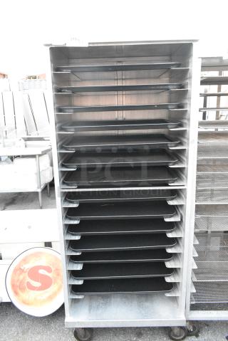 Metal Pan Transport Rack on Commercial Casters w/ Black Poly Trays.