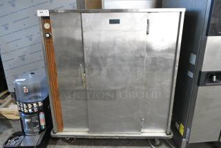 FWE P-120 Stainless Steel Commercial Single Door Heated Holding Cabinet on Commercial Casters.  115 Volts, 1 Phase. Cannot Test Due To Cut Power Cord
