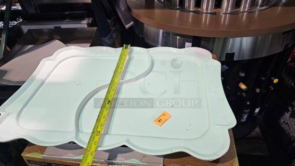 Platter. Aluminum alloy construction. Durable and unbreakable. 100% food safe. Unique shape adds an exotic touch. Safe for use at temperatures of -20° F up to 650° F. Superior conduction keeps hot food hot and cold food cold. Perfect for serving and displaying appetizers or desserts - Image 2 of 2