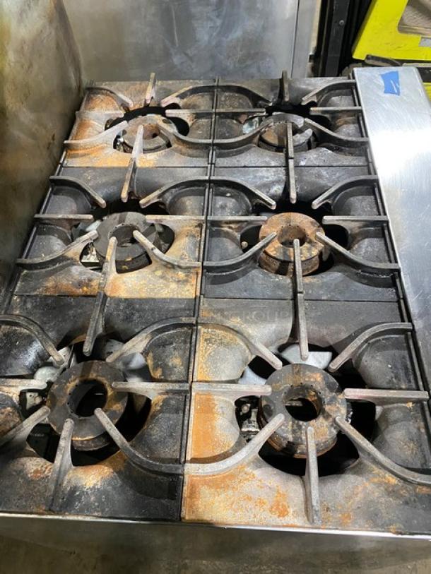 Asber Commercial Stainless Steel Natural Gas Powered 6 Burner Range! With Full Sized Oven Underneath! With Back Splash & Overhead Salamander Shelf! With Oven Rack! On Casters! - Image 5 of 9