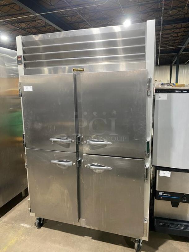 Traulsen Commercial Stainless Steel 2 Section Half Door Reach In Refrigerator! With Left & Right Hinged Doors! With Poly Coated Wire Shelves! On Casters! 115V 1 Phase! Model: G20000 SN: T48193C07! - Image 1 of 9