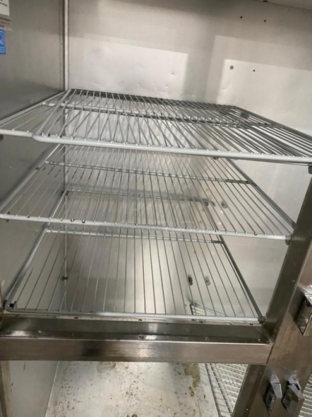 Traulsen Commercial Stainless Steel 2 Section Half Door Reach In Refrigerator! With Left & Right Hinged Doors! With Poly Coated Wire Shelves! On Casters! 115V 1 Phase! Model: G20000 SN: T48193C07! - Image 6 of 9