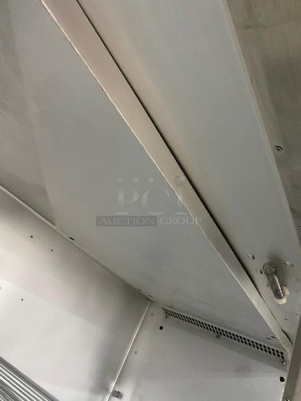 Traulsen Commercial Stainless Steel 2 Section Half Door Reach In Refrigerator! With Left & Right Hinged Doors! With Poly Coated Wire Shelves! On Casters! 115V 1 Phase! Model: G20000 SN: T48193C07! - Image 7 of 9