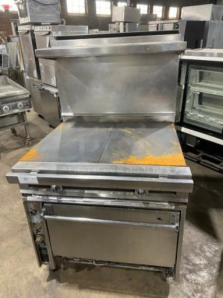 Commercial Stainless Steel Natural Gas Powered 2 Burner French Top Range! With Full Size Oven Underneath! With Back Splash & Overhead Salamander Shelf! With Pan Rail! With Wire Oven Racks! On Casters!