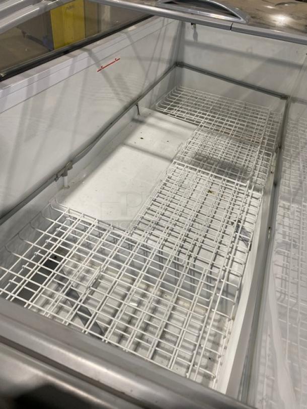 Novum Commercial Curved Sliding Glass Lid Ice Cream Display Cabinet/Freezer Merchandiser! With Poly Coated Wire Shelves!  On Casters! 120V! Model: 710L SN: WKSCG121/10136! - Image 5 of 8