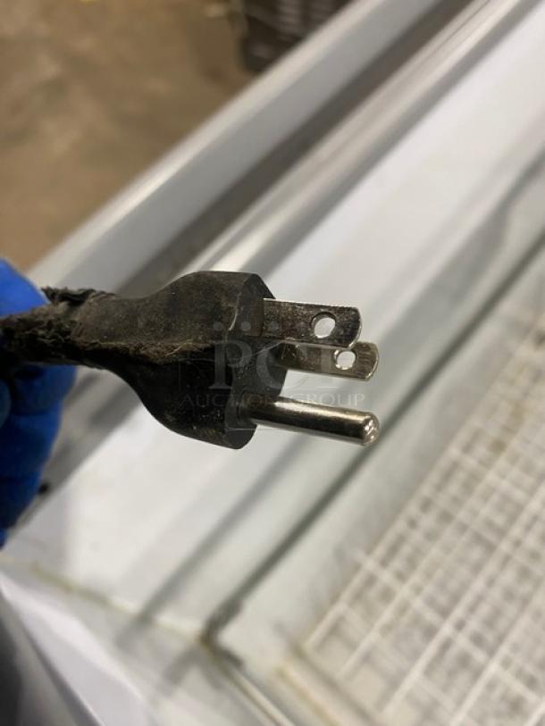 Novum Commercial Curved Sliding Glass Lid Ice Cream Display Cabinet/Freezer Merchandiser! With Poly Coated Wire Shelves!  On Casters! 120V! Model: 710L SN: WKSCG121/10136! - Image 8 of 8