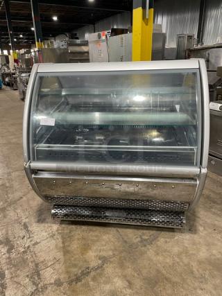 SeVel Commercial Stainless Steel Refrigerated Bakery Display Case! With Tempered, Non-Glare, Lift-Up Curved Front Glass! With Double Sliding Door Rear Access! With Rear Pull Out Loading Drawer! On Casters!