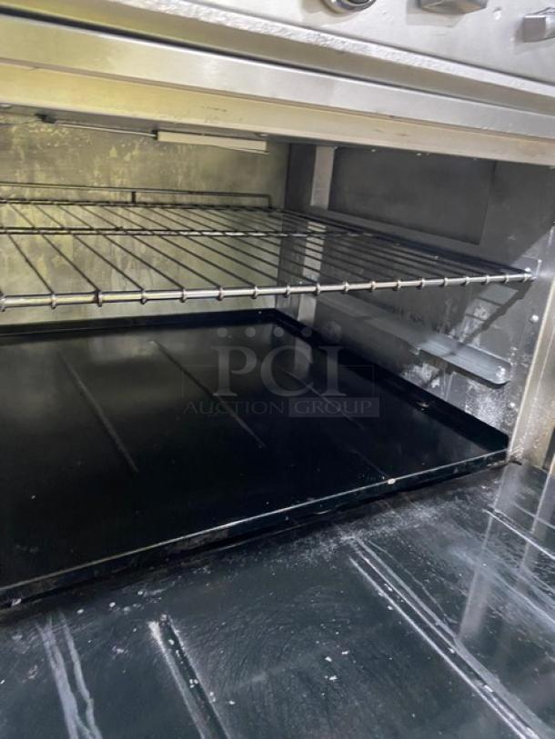 Bakers Pride Commercial Stainless Steel Natural Gas Powered 10 Burner Range! With 2 Full Sized Ovens Underneath! With Back Splash & Overhead Salamander Shelf! With Wire Oven Racks! On Casters! - Image 8 of 9