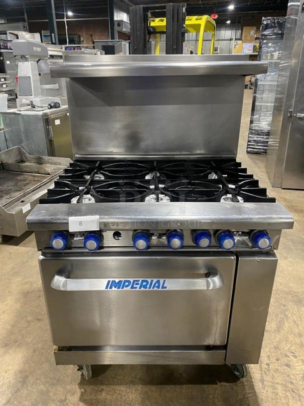 Imperial Commercial Stainless Steel Natural Gas Powered 6 Burner Range! With Full Size Oven Underneath! With Back Splash & Overhead Salamander Shelf! With Wire Oven Racks! On Casters! - Image 1 of 9