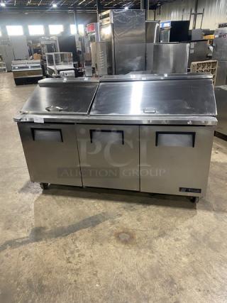 True Commercial Stainless Steel 3 Door Refrigerated Mega Top Salad/Sandwich Prep Table! With Poly Coated Wire Racks! On Casters! 115V 1 Phase! Model: TSSU-72-18 SN: 1-4477571! - Item #1153311