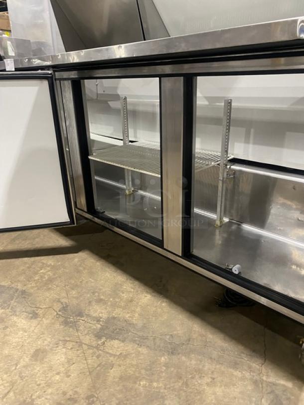 True Commercial Stainless Steel 3 Door Refrigerated Mega Top Salad/Sandwich Prep Table! With Poly Coated Wire Racks! On Casters! 115V 1 Phase! Model: TSSU-72-18 SN: 1-4477571! - Image 6 of 9