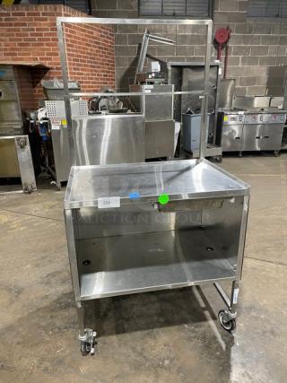 National Cart Commercial Stainless Steel Customized Worktop Cart! With Enclosed Storage Base! With Single Pull-Out Drawer! With 2 Front Drop-Down Folding Shelves! With Overhead Bracket! On Casters!