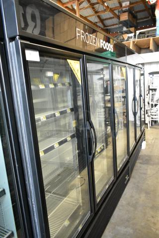 2018 True GDM-72F-HC Metal Commercial 3 Door Reach In Freezer Merchandiser w/ Poly Coated Racks. 208-230 Volts, 1 Phase. Tested and Working!