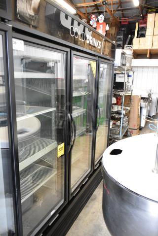 2017 True GDM-72-HC Metal Commercial 3 Door Reach In Cooler Merchandiser w/ Poly Coated Racks. 208-230 Volts, 1 Phase. Tested and Working!