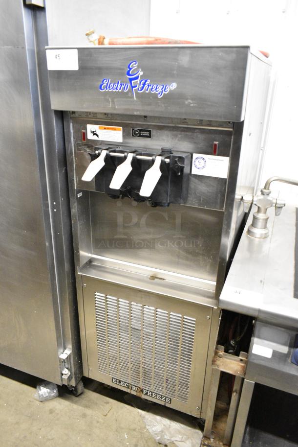 Electro Freeze SL500-132 Stainless Steel Commercial Floor Style Water Cooled 2 Flavor w/ Twist Soft Serve Soft Serve Ice Cream Machine on Commercial Casters. 208-230 Volts, 3 Phase. - Image 1 of 10