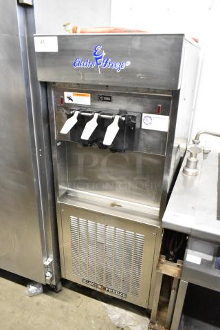 Electro Freeze SL500-132 Stainless Steel Commercial Floor Style Water Cooled 2 Flavor w/ Twist Soft Serve Soft Serve Ice Cream Machine on Commercial Casters. 208-230 Volts, 3 Phase.