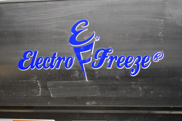 Electro Freeze SL500-132 Stainless Steel Commercial Floor Style Water Cooled 2 Flavor w/ Twist Soft Serve Soft Serve Ice Cream Machine on Commercial Casters. 208-230 Volts, 3 Phase. - Image 2 of 10