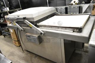 Sipromatic 650A Metal Commercial Floor Style Vacuum Sealer on Commercial Casters. 208 Volts, 3 Phase.