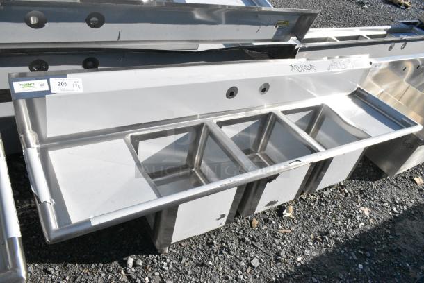 BRAND NEW SCRATCH AND DENT! Regency 600S31515215 Stainless Steel 3 Bay Sink w/ Dual Drain Boards. No Legs. Bays 15x15x12. Drain Boards 12x16 - Image 1 of 5