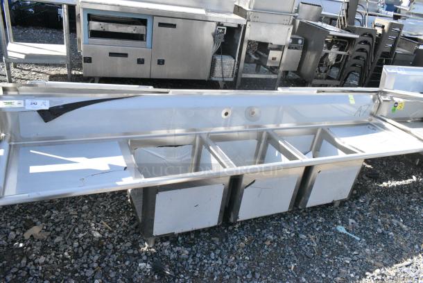 BRAND NEW SCRATCH AND DENT! Regency 600S31818224 Stainless Steel Commercial 3 Bay Sink w/ Dual Drain Boards. No Legs. Bays 18x18x14. Drain Boards 22x20 - Image 1 of 5