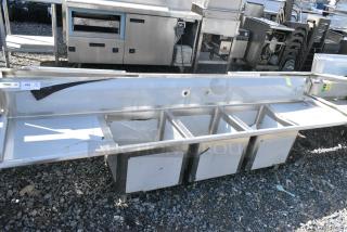 BRAND NEW SCRATCH AND DENT! Regency 600S31818224 Stainless Steel Commercial 3 Bay Sink w/ Dual Drain Boards. No Legs. Bays 18x18x14. Drain Boards 22x20