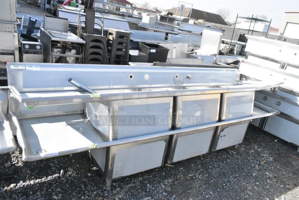 BRAND NEW SCRATCH AND DENT! Regency 600S32424224 Stainless Steel Commercial 3 Bay Sink w/ Dual Drain Boards. Bays 24x24x14. Drain Boards 22x26 - Image 1 of 6
