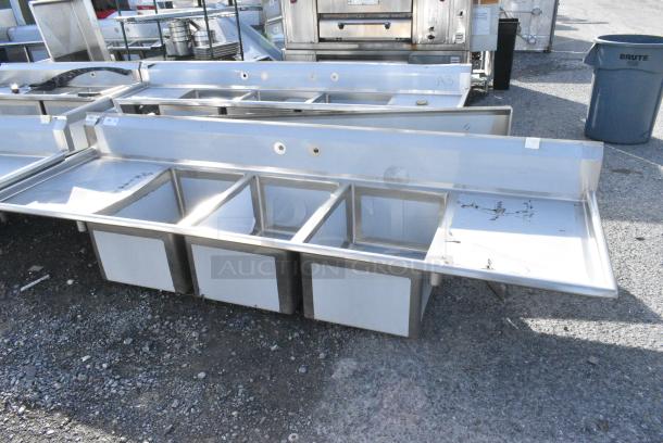BRAND NEW SCRATCH AND DENT! Regency 600S32028224 Stainless Steel Commercial 3 Bay Sink w/ Dual Drain Boards. No Legs. Bays 20x28x18. Drain Boards 24x30 - Image 1 of 5