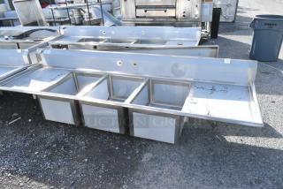 BRAND NEW SCRATCH AND DENT! Regency 600S32028224 Stainless Steel Commercial 3 Bay Sink w/ Dual Drain Boards. No Legs. Bays 20x28x18. Drain Boards 24x30