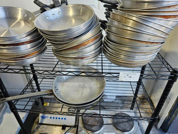 WOW! HUGE Lot Frying Pans, Various Sizes SHELVING INCLUDED! - Image 1 of 2