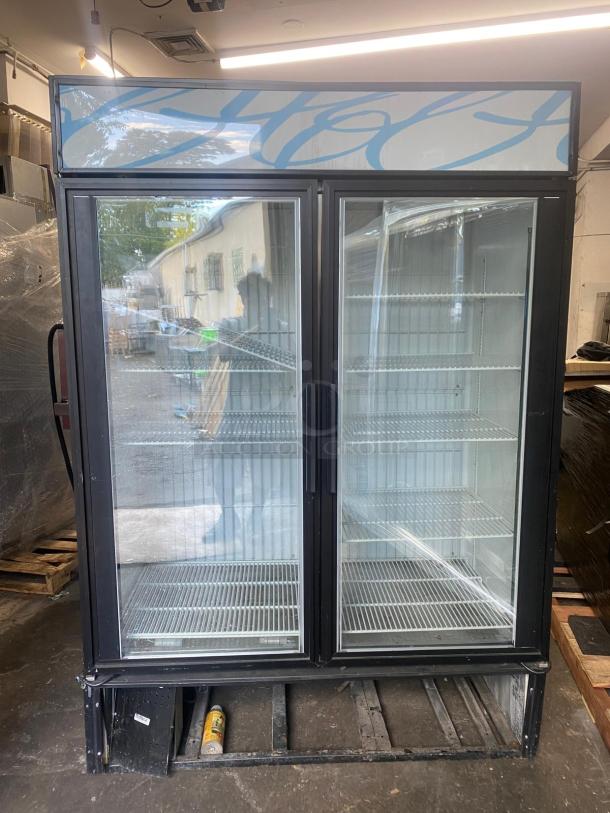 TRUE GDM-49f - Two Section Glass Hinged Door Bottom Mounted 49 cu ft Freezer Merchandisers no compressor - Image 1 of 3